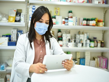 Health care worker using tablet