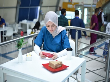 Health care worker using phone